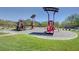 Community playground with play equipment and shade structures for neighborhood children at 3949 Amanda Bay Ave, North Las Vegas, NV 89081