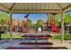 Community playground with picnic tables and play structures, providing a recreational area at 3949 Amanda Bay Ave, North Las Vegas, NV 89081