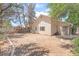 The backyard is a blank canvas for landscaping and design with a patio area at 4516 Cielo Ln, Las Vegas, NV 89130