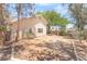 View of the cozy backyard with a patio area, great for relaxing or entertaining at 4516 Cielo Ln, Las Vegas, NV 89130