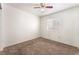 Cozy bedroom featuring neutral carpet and a ceiling fan with light fixture at 4516 Cielo Ln, Las Vegas, NV 89130