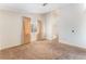 Bright bedroom featuring neutral carpet, large window, and ample closet space at 4516 Cielo Ln, Las Vegas, NV 89130