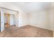 Spacious bedroom with neutral carpet and view to hall at 4516 Cielo Ln, Las Vegas, NV 89130