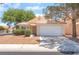 Inviting single-story home with two-car garage and xeriscaping for low maintenance at 4516 Cielo Ln, Las Vegas, NV 89130
