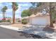 Attractive single-story home with a two-car garage, surrounded by well-kept landscaping at 4516 Cielo Ln, Las Vegas, NV 89130