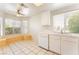 Eat-in kitchen area with natural light, a built-in bench, and ample space for dining at 4516 Cielo Ln, Las Vegas, NV 89130