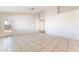 Sunny living space with tile flooring and access to the outdoor patio at 4516 Cielo Ln, Las Vegas, NV 89130