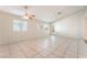 Bright, spacious living room boasts tile floors and plenty of natural light at 4516 Cielo Ln, Las Vegas, NV 89130