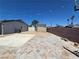 Spacious backyard featuring a large shed and ample space for various outdoor activities at 4823 El Tesoro Ave, Las Vegas, NV 89121