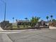 Charming single story home featuring desert landscaping, corner lot, and solar panels at 4823 El Tesoro Ave, Las Vegas, NV 89121