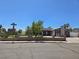 Charming single story home featuring desert landscaping, stone chimney, and solar panels at 4823 El Tesoro Ave, Las Vegas, NV 89121