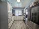 Bright kitchen with ample cabinetry, tile backsplash, and stainless steel appliances at 4823 El Tesoro Ave, Las Vegas, NV 89121