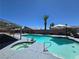 Inviting backyard pool and spa surrounded by decking, perfect for relaxation and entertainment at 4823 El Tesoro Ave, Las Vegas, NV 89121