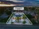 An aerial view of a single-story house, highlighting the roof-mounted solar panels at 5486 Alfred Dr, Las Vegas, NV 89108