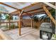 Covered outdoor patio area with a grill, perfect for entertaining and outdoor cooking at 5486 Alfred Dr, Las Vegas, NV 89108