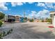 Large, spacious, open backyard with gravel landscaping and a trailer at 5486 Alfred Dr, Las Vegas, NV 89108