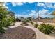 Spacious backyard featuring gravel landscaping and sidewalk at 5486 Alfred Dr, Las Vegas, NV 89108