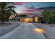 Beautiful single-story brick home with long driveway and stunning desert landscaping at 5486 Alfred Dr, Las Vegas, NV 89108