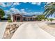 Lovely one-story home featuring desert landscaping and a long driveway at 5486 Alfred Dr, Las Vegas, NV 89108