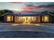 Beautiful single-story brick home with a long driveway and inviting front porch at 5486 Alfred Dr, Las Vegas, NV 89108