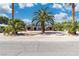 Beautiful single-story brick home with a long driveway and desert landscaping at 5486 Alfred Dr, Las Vegas, NV 89108