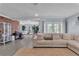 Bright living room with neutral tones, recessed lighting, and hardwood flooring at 5486 Alfred Dr, Las Vegas, NV 89108