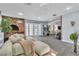Bright and open living room features French doors, hardwood floors, and neutral decor at 5486 Alfred Dr, Las Vegas, NV 89108