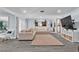 Comfortable living room showcases a large sectional couch, recessed lighting and neutral tones at 5486 Alfred Dr, Las Vegas, NV 89108