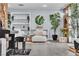 Cozy living room featuring a decorative fireplace, modern shelving, and comfortable seating at 5486 Alfred Dr, Las Vegas, NV 89108
