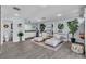 Relaxing living room with white cabinets, a mini-fridge, and hardwood flooring at 5486 Alfred Dr, Las Vegas, NV 89108