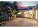 Cozy outdoor patio with a screened enclosure, offering a private and serene retreat at 5486 Alfred Dr, Las Vegas, NV 89108