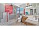 Bathroom featuring a glass-enclosed shower, dual vanities, and contemporary fixtures during renovations at 5612 Royal Castle Ln, Las Vegas, NV 89130