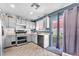 Well-equipped kitchen with modern appliances, sleek countertops, and plenty of cabinet space at 5612 Royal Castle Ln, Las Vegas, NV 89130