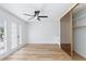 Bedroom with ceiling fan, closet, and door to balcony at 572 Tam O Shanter, Las Vegas, NV 89109