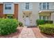 Inviting exterior showcasing lush landscaping and a quaint walkway to the front door at 572 Tam O Shanter, Las Vegas, NV 89109