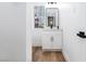 Stylish powder room features modern vanity with vessel sink and minimalist mirror at 572 Tam O Shanter, Las Vegas, NV 89109