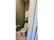 Small bathroom with toilet and storage space provides essential facilities at 6363 Berry Patch Way, Las Vegas, NV 89142