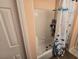 Bathtub with shower and shower curtain offers a comfortable washing experience at 6363 Berry Patch Way, Las Vegas, NV 89142