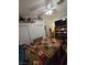 Bedroom offers shelving, closet space, ceiling fan, and natural light at 6363 Berry Patch Way, Las Vegas, NV 89142