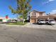 Charming two-story home with a well-manicured lawn and an attached two-car garage at 6363 Berry Patch Way, Las Vegas, NV 89142