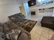 Inviting living room featuring a fireplace and built-in shelving at 6363 Berry Patch Way, Las Vegas, NV 89142