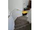 Staircase with neutral carpet offers access to upper levels, complete with a railing at 6363 Berry Patch Way, Las Vegas, NV 89142