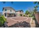 View of the backyard featuring a covered patio and desert landscaping at 6377 W Haleh Ave, Las Vegas, NV 89141