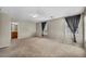 Open primary bedroom features carpet, recessed lighting, and two large windows at 6377 W Haleh Ave, Las Vegas, NV 89141