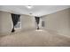 Expansive bedroom features neutral carpet, recessed lighting, and modern window coverings at 6377 W Haleh Ave, Las Vegas, NV 89141