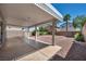 Covered outdoor patio with desert landscaping at 6377 W Haleh Ave, Las Vegas, NV 89141