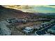 Gorgeous aerial view of the neighborhood showing the surrounding landscape, mountains, and community layout at 6433 Farness St, Las Vegas, NV 89135