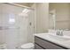 Clean and modern bathroom with shower, toilet and vanity with stone countertop at 6433 Farness St, Las Vegas, NV 89135