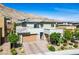 Charming two-story home with a two-car garage, paver driveway and mountain views at 6433 Farness St, Las Vegas, NV 89135