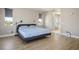 Light-filled main bedroom featuring recessed lights and an ensuite bathroom at 6433 Farness St, Las Vegas, NV 89135
